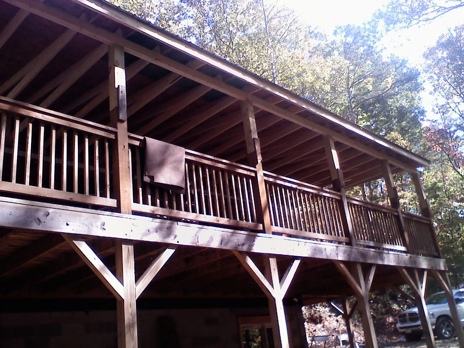 Timber framing under a new elevated porch and deck — Roof Leak Repair in North Stonington by Roofing Brothers